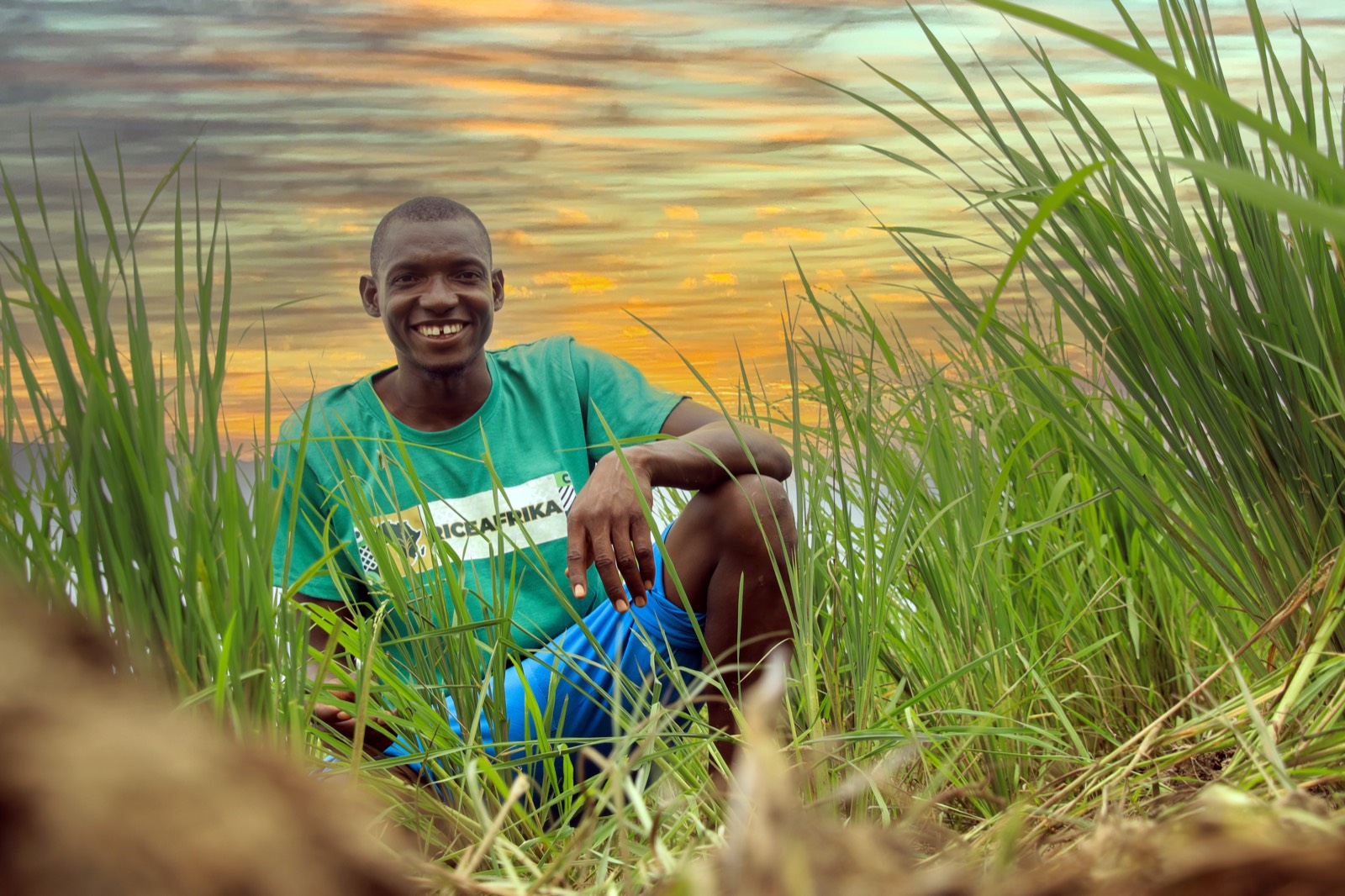 A FarmEASY field officer in the field at dusk